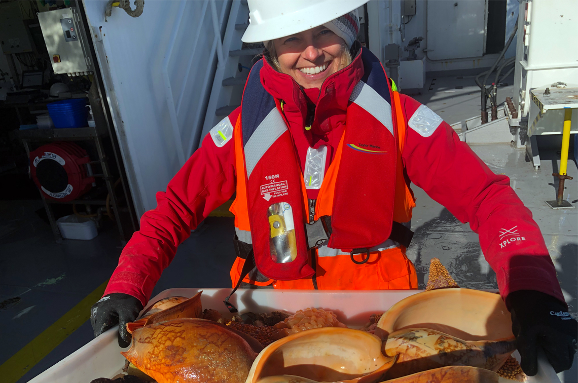 Sahan Jayasinghe and Cindy Bessey of CSIRO conducted the 'paired sampling' on the SEA-MES voyages. Here, Dr Bessey sorts through the invertebrate catch from a bottom trawl. The passive eDNA sampler is being optimised to collect an integrated marine sample that detects fish as well as gastropods and echinoderms seen here. Image: CSIRO