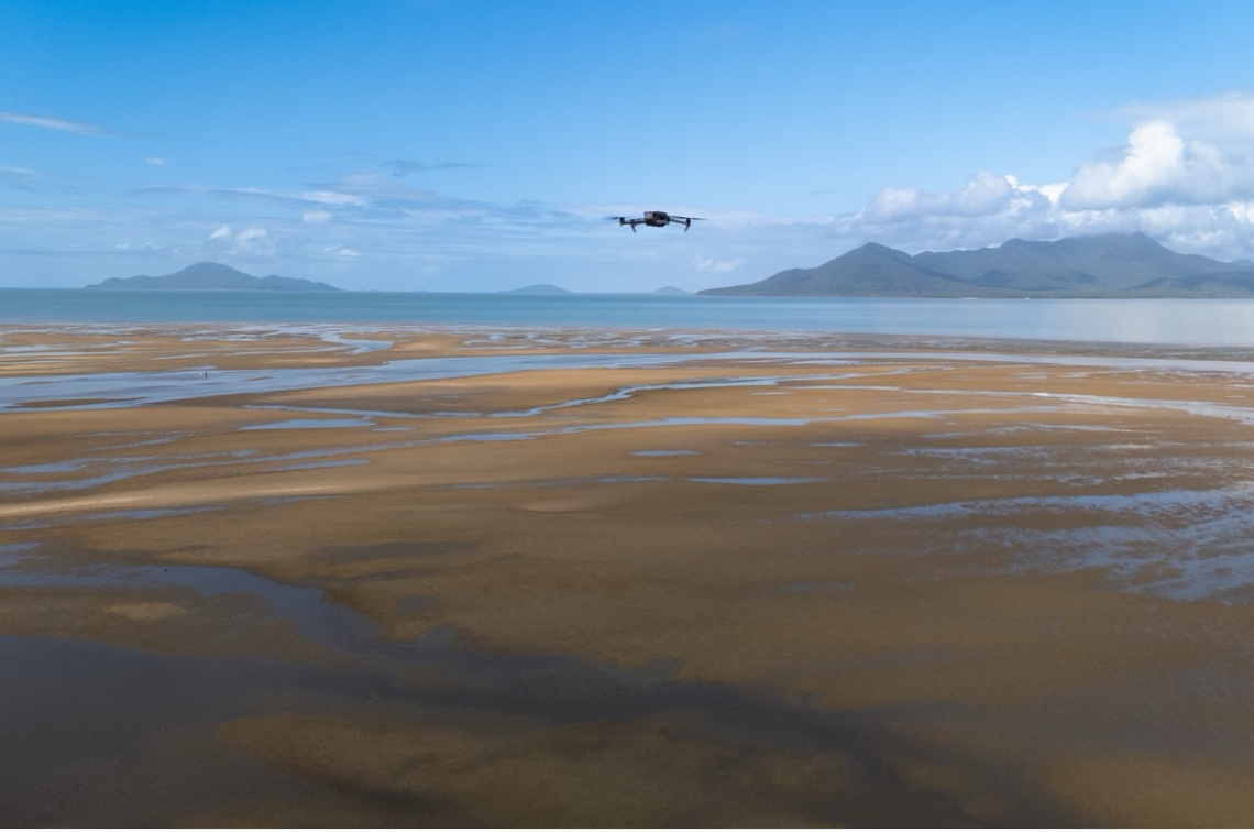 Drone flying above the intertidal seagrass meadow on Girramay Country at Meunga Creek, QLD. Image: Styledia.