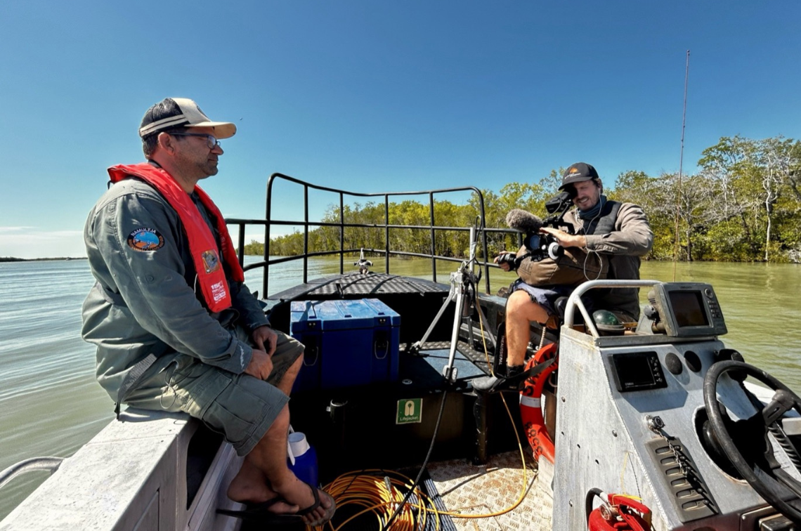Marranbala Ranger David Barrett being filmed on Marra Sea Country by filmmaker Sam Frederick (Limmen River, NT). Image: Alex Carter, JCU.